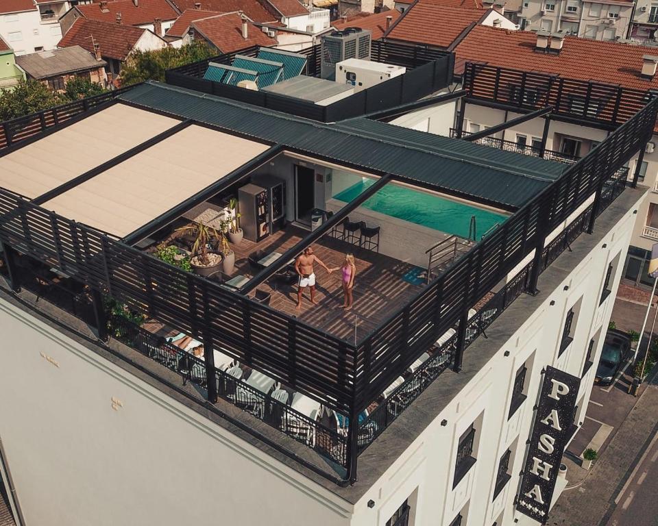 an aerial view of a building with a swimming pool at Hotel Pasha in Mostar