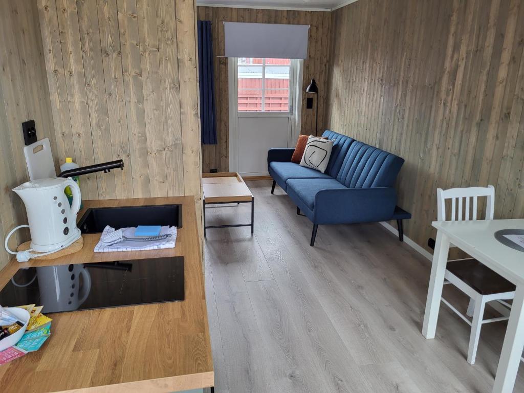 Posezení v ubytování Å Rorbuer - by Classic Norway Hotels