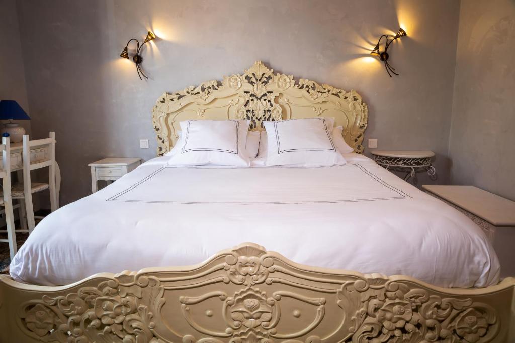 Postel nebo postele na pokoji v ubytování Chambre d'Hôtes Au Jardin Des Saveurs