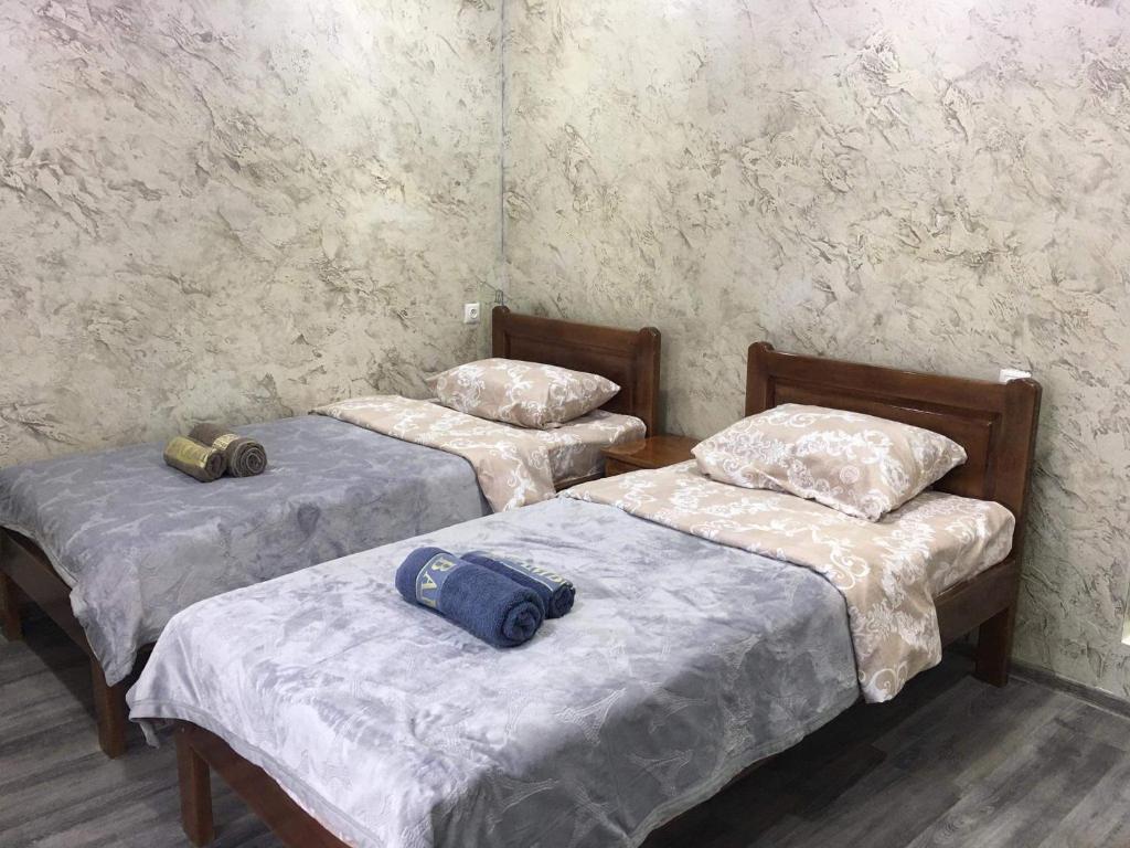 Postel nebo postele na pokoji v ubytování Guest House Diana