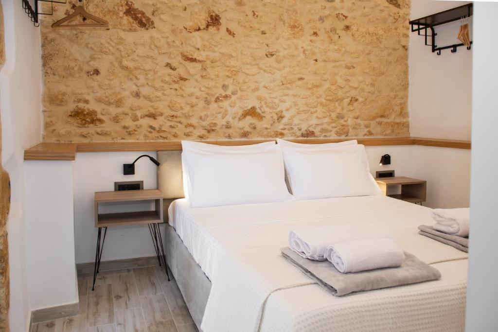 Łóżko lub łóżka w pokoju w obiekcie Casa Piedra