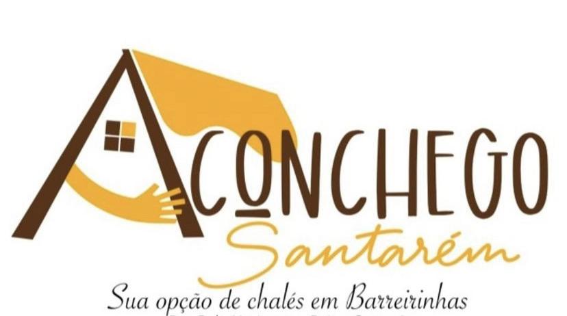 a logo for a restaurant with a person holding an umbrella at Pousada Aconchego Santarém in Barreirinhas