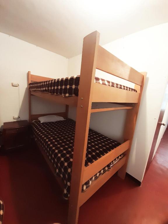 Postel nebo postele na pokoji v ubytování Maypa Lima Airport