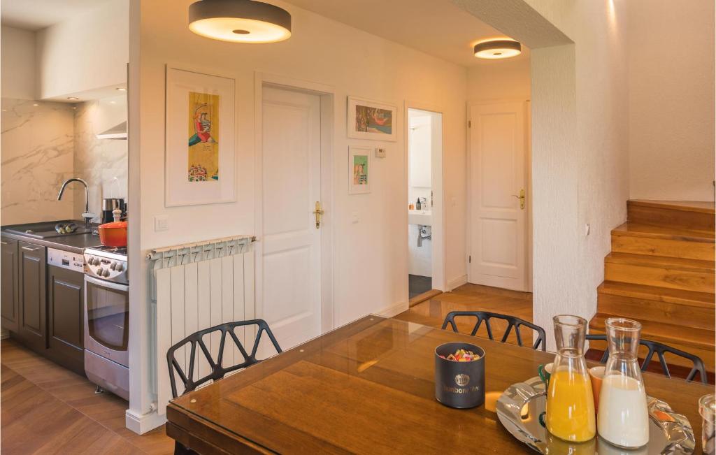 Kuchyň nebo kuchyňský kout v ubytování Apartment Biskupija Iv