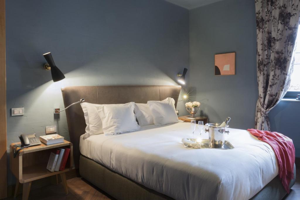 Postel nebo postele na pokoji v ubytování Hotel Garibaldi Blu - WTB Hotels