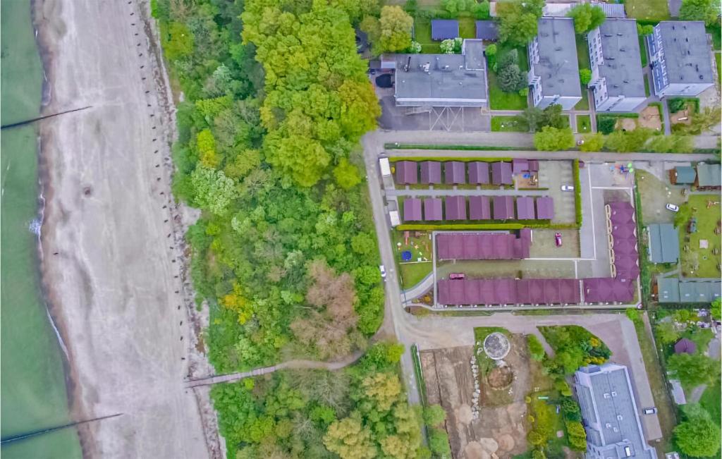 an overhead view of a suburb with houses and a road at Stunning Home In Sianozety With Kitchenette in Sianozety