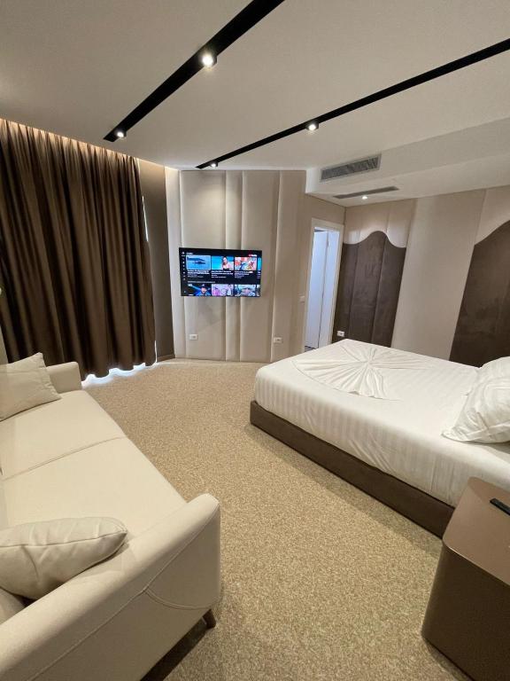 Postel nebo postele na pokoji v ubytování Hotel PortSide GF