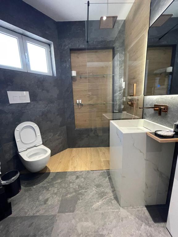 Koupelna v ubytování Hotel PortSide GF