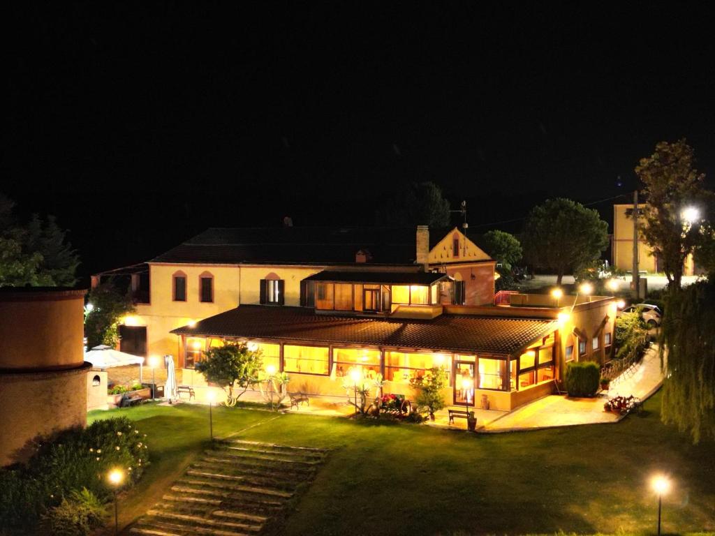 a large house at night with lights on it at Masseria La Guardata in Guglionesi