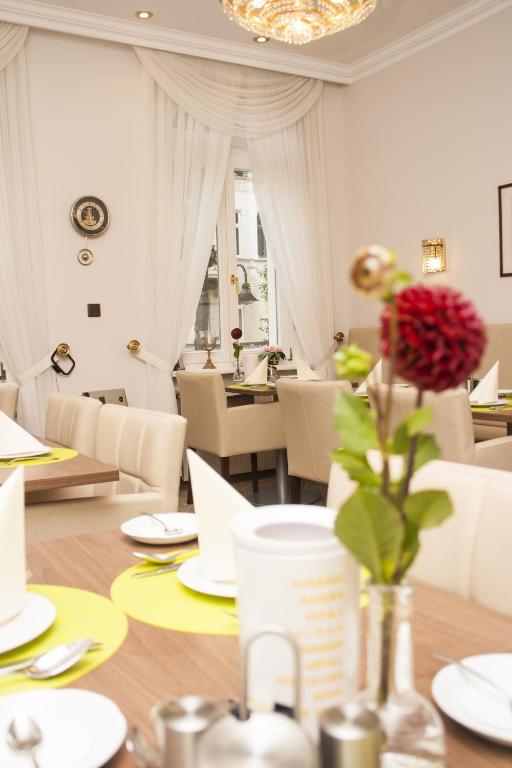 Ein Sitzbereich in der Unterkunft Hotel Haus Berlin