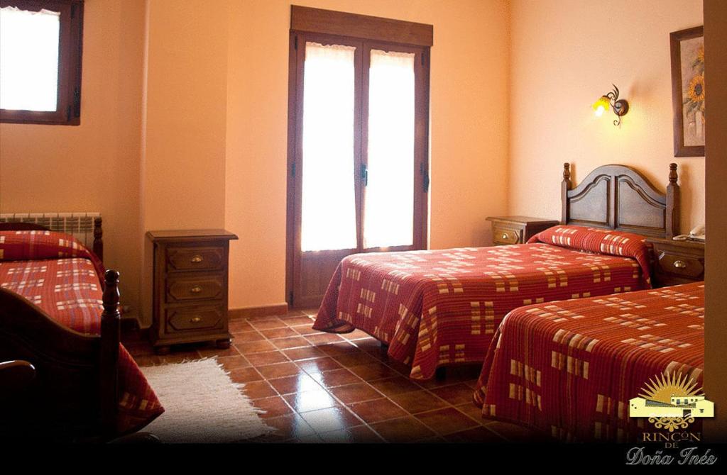 Postel nebo postele na pokoji v ubytování Hotel Rural Rincón de Doña Inés
