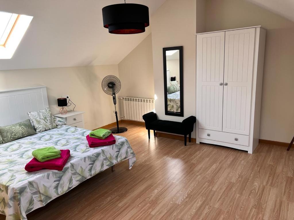 A bed or beds in a room at La Casita del Risco