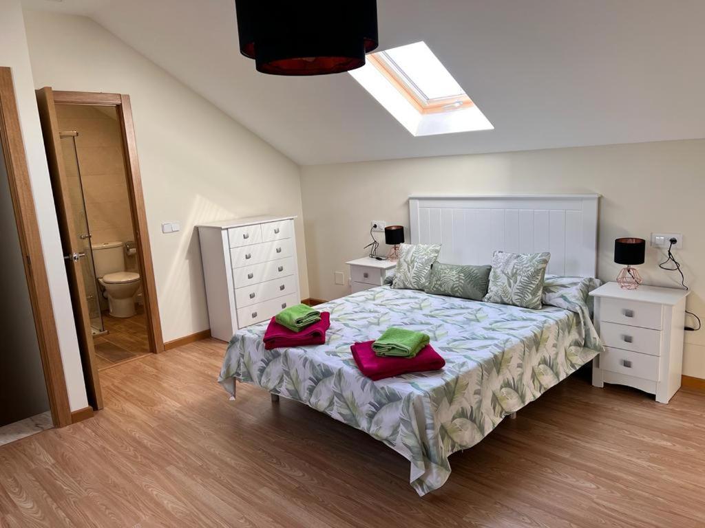 A bed or beds in a room at La Casita del Risco