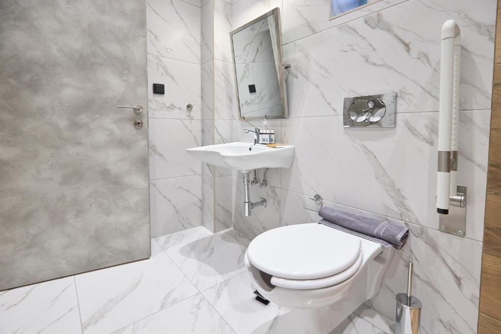 Łazienka w obiekcie Oisymi Luxury Studios
