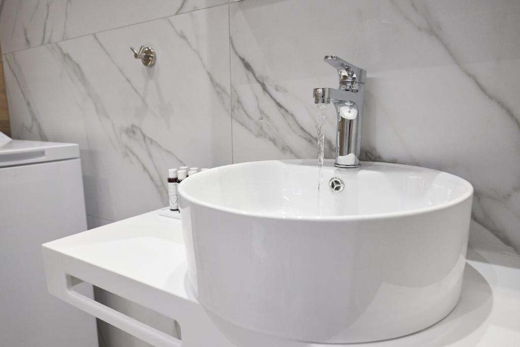 Łazienka w obiekcie Oisymi Luxury Studios