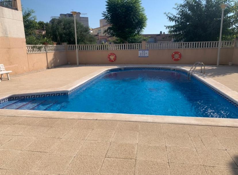 Bazén v ubytovaní Casa de playa alebo v jeho blízkosti