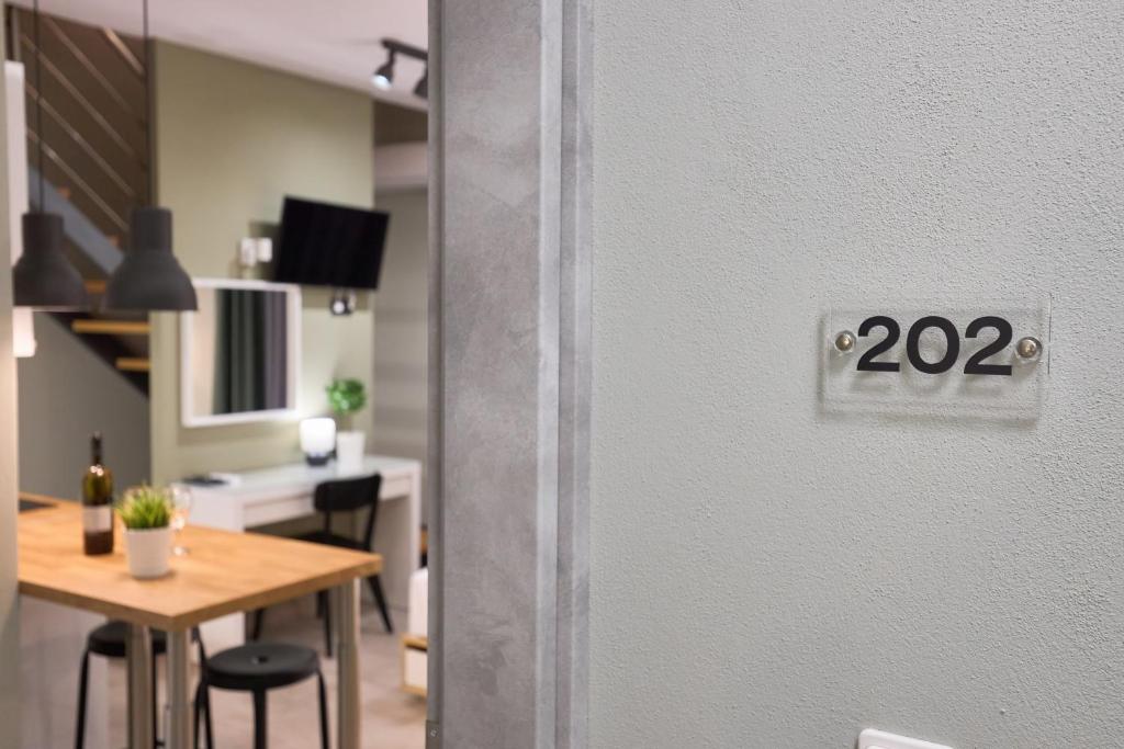 Telewizja i/lub zestaw kina domowego w obiekcie Oisymi Luxury Studios