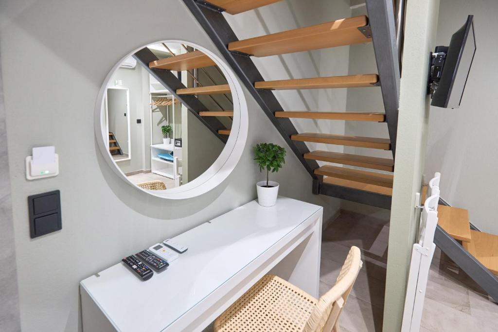 Telewizja i/lub zestaw kina domowego w obiekcie Oisymi Luxury Studios