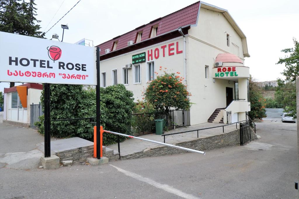 a hotel rescue sign in front of a building at Hotel Rose in Tbilisi City