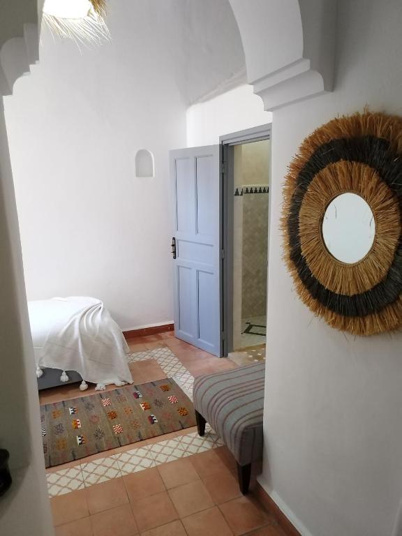 Кровать или кровати в номере RIAD MAROSKO