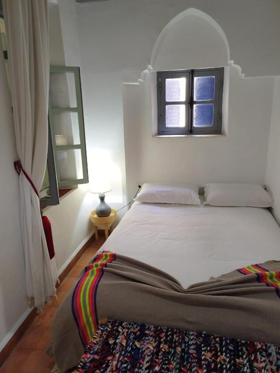 Кровать или кровати в номере RIAD MAROSKO