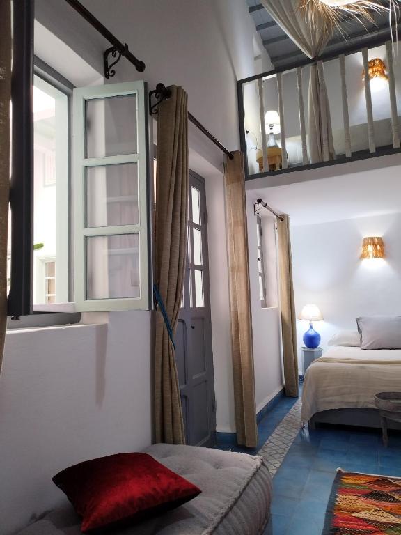 Кровать или кровати в номере RIAD MAROSKO