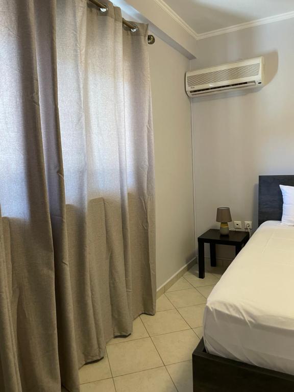 Postel nebo postele na pokoji v ubytování Aria Apartment 2