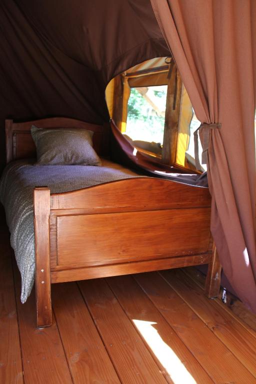 Postel nebo postele na pokoji v ubytování Chez Tombivouac