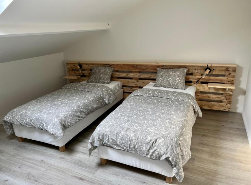 Postel nebo postele na pokoji v ubytování Happy Duplex