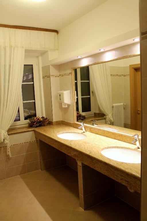 Koupelna v ubytování Albergo Trentino