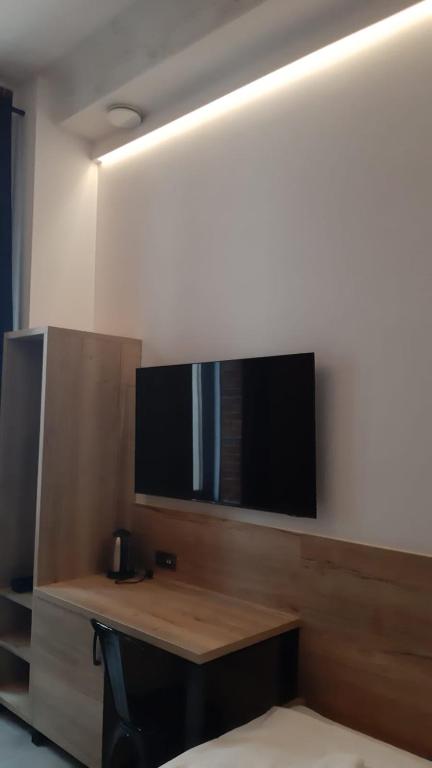 Telewizja i/lub zestaw kina domowego w obiekcie Aparthotel Łódź 55 Piotrkowska