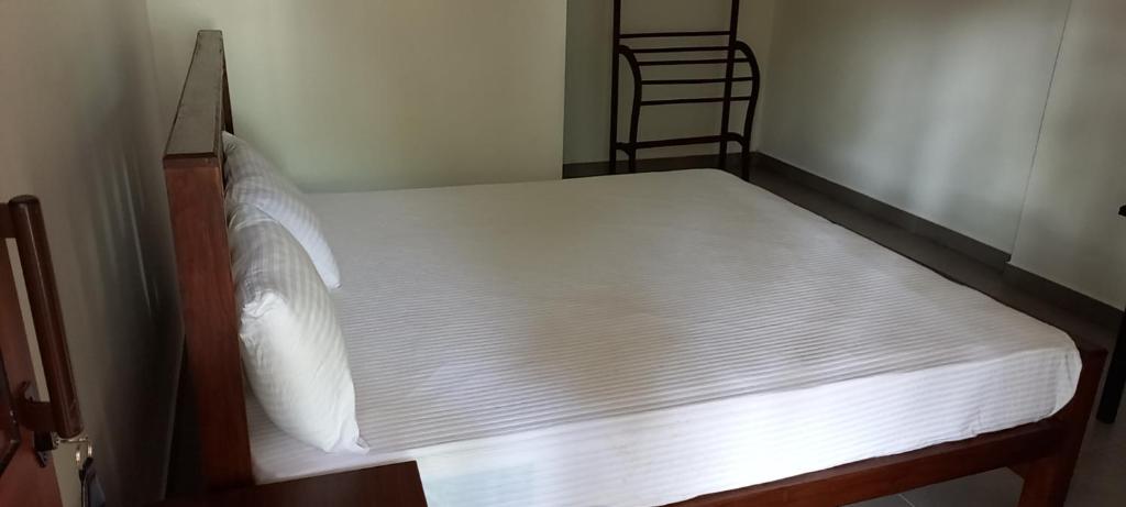 Postel nebo postele na pokoji v ubytování Shady transit hotel