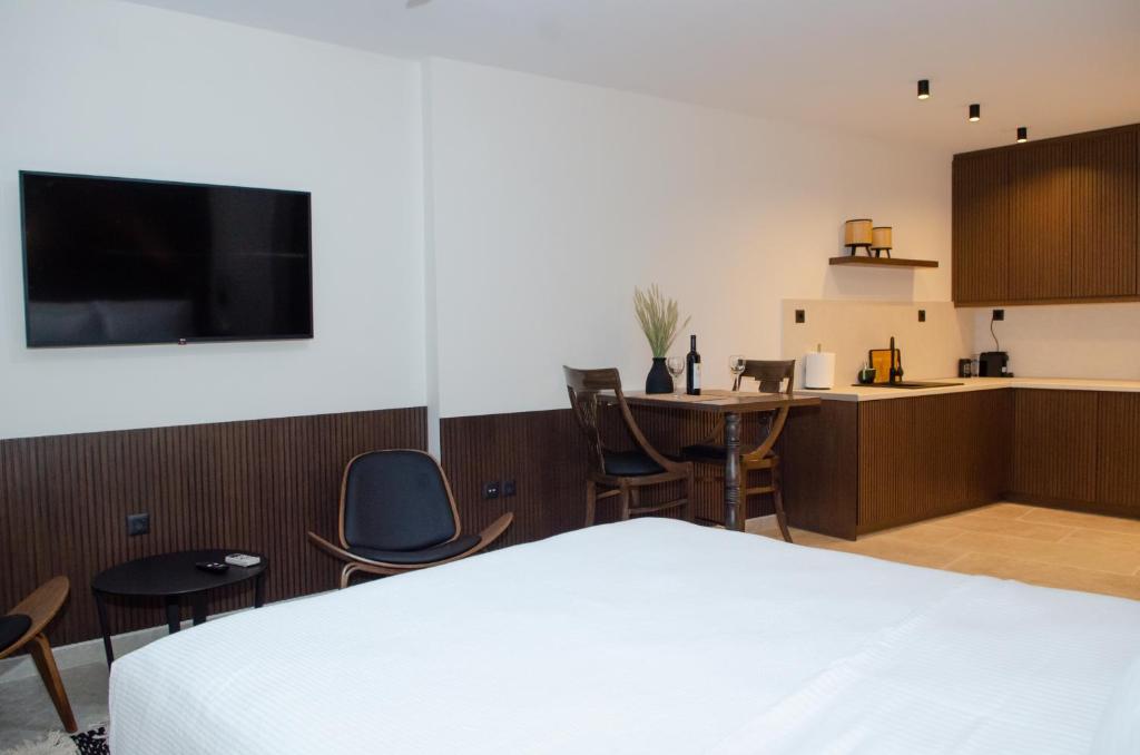 Posteľ alebo postele v izbe v ubytovaní Leone suites