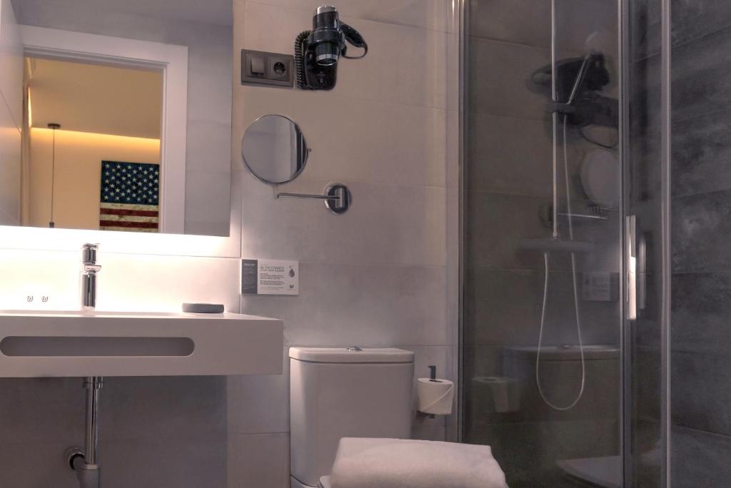 Kúpeľňa v ubytovaní Woohoo Rooms Boutique Sol