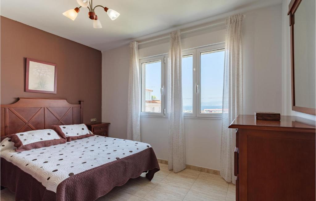 Postel nebo postele na pokoji v ubytování Cozy Home In Porto Do Son With Wifi