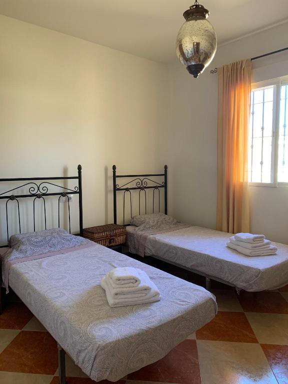 Postel nebo postele na pokoji v ubytování Villa Belle