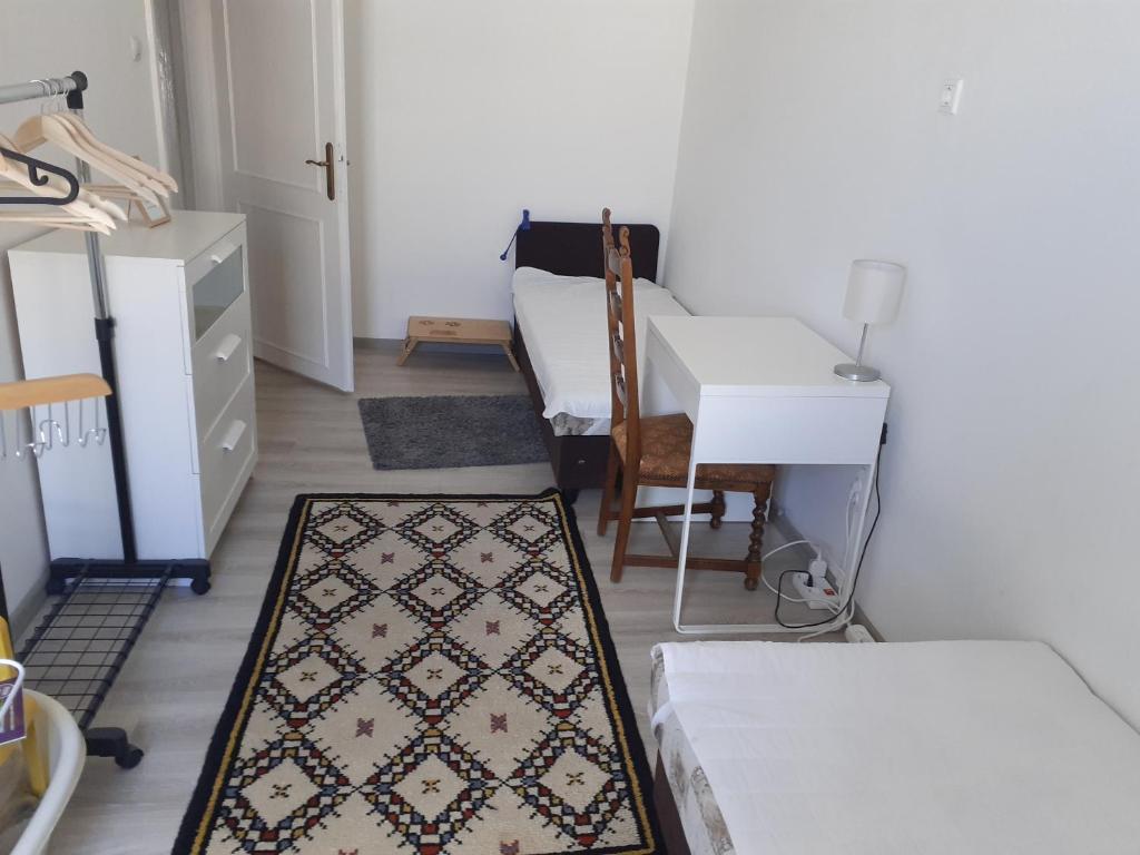 Posteľ alebo postele v izbe v ubytovaní Budapest City Bridge Apartman