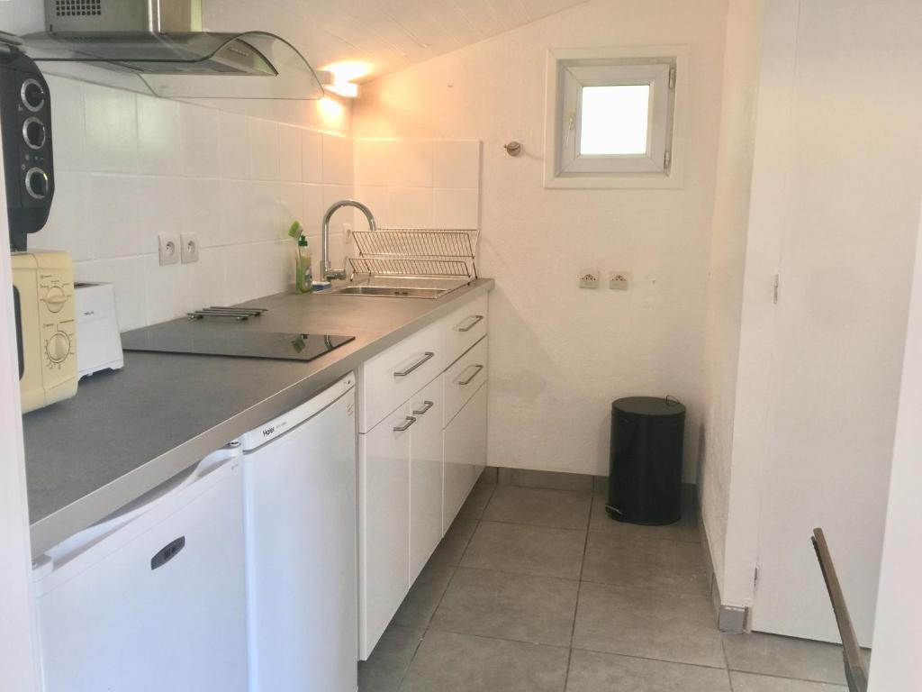Kuchyň nebo kuchyňský kout v ubytování Maisonnette studio Arcachon 300m plage