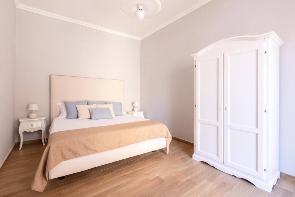 Łóżko lub łóżka w pokoju w obiekcie 4711 Boutique Apartment
