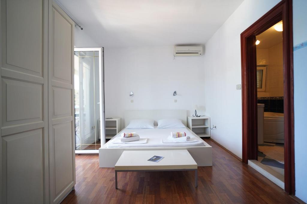 Posteľ alebo postele v izbe v ubytovaní Sea House Mljet