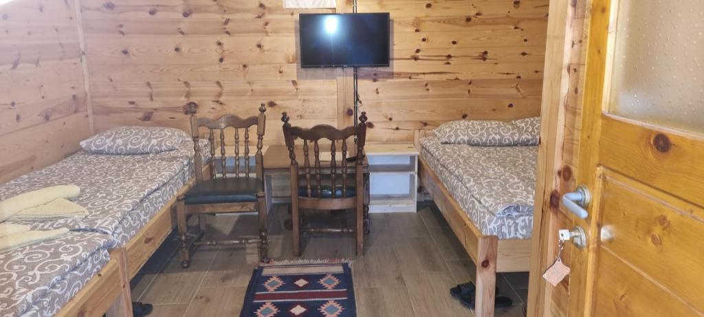 Postel nebo postele na pokoji v ubytování Kod Elka