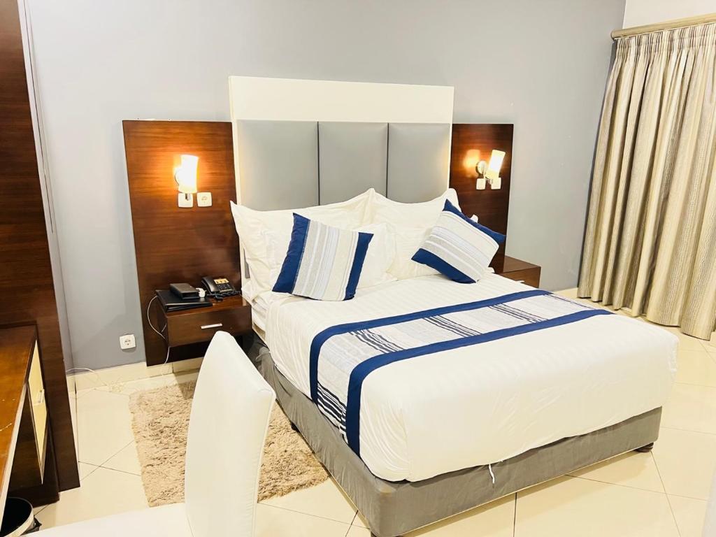 Postel nebo postele na pokoji v ubytování Hotel Amirana