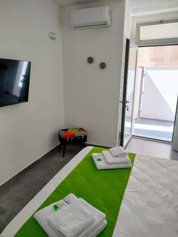 Postel nebo postele na pokoji v ubytování B&b Leo