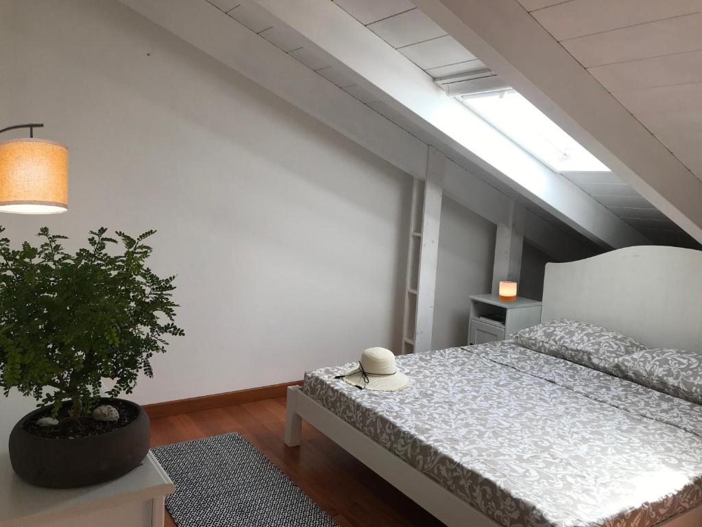 Postel nebo postele na pokoji v ubytování Tartaruga House