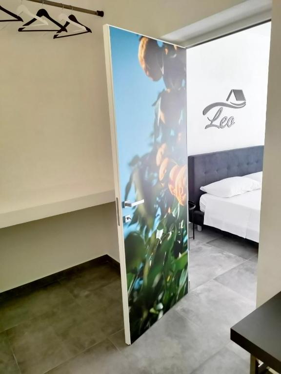 Postel nebo postele na pokoji v ubytování B&b Leo