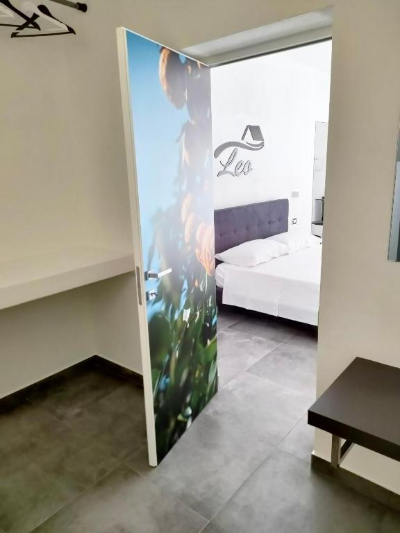 Postel nebo postele na pokoji v ubytování B&b Leo
