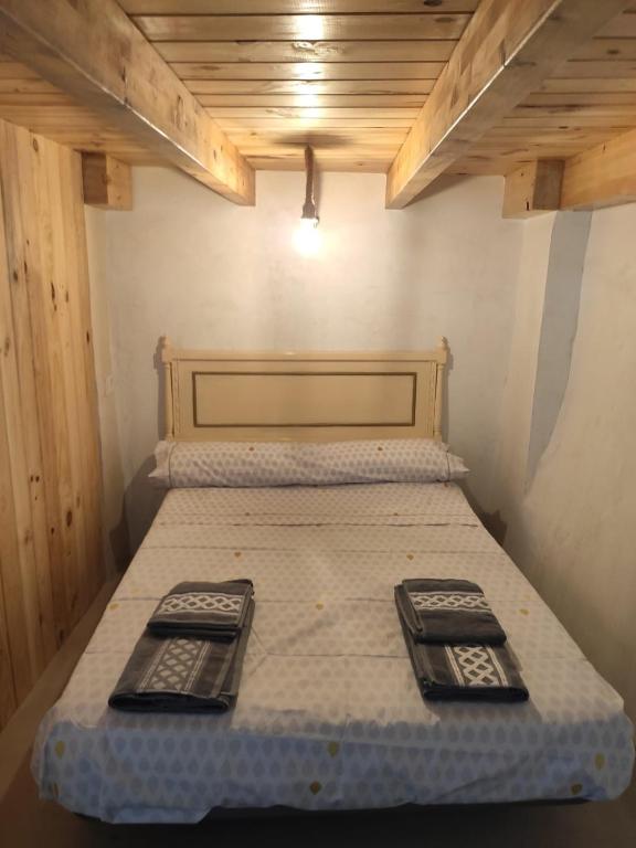 Postel nebo postele na pokoji v ubytování Ático El Más allá