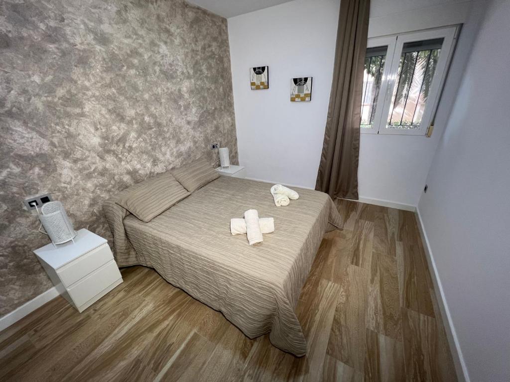 Posteľ alebo postele v izbe v ubytovaní Camaretas sweet dreams acogedor piso junto al mar