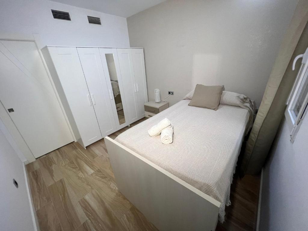 Posteľ alebo postele v izbe v ubytovaní Camaretas sweet dreams acogedor piso junto al mar
