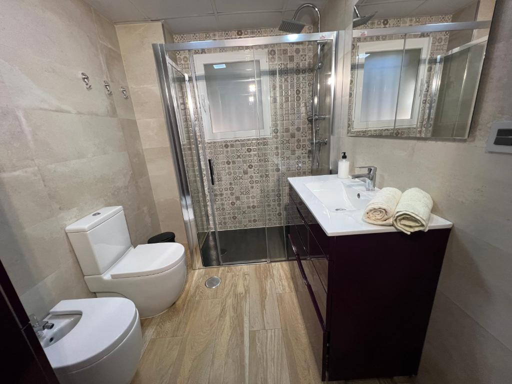 Kúpeľňa v ubytovaní Camaretas sweet dreams acogedor piso junto al mar